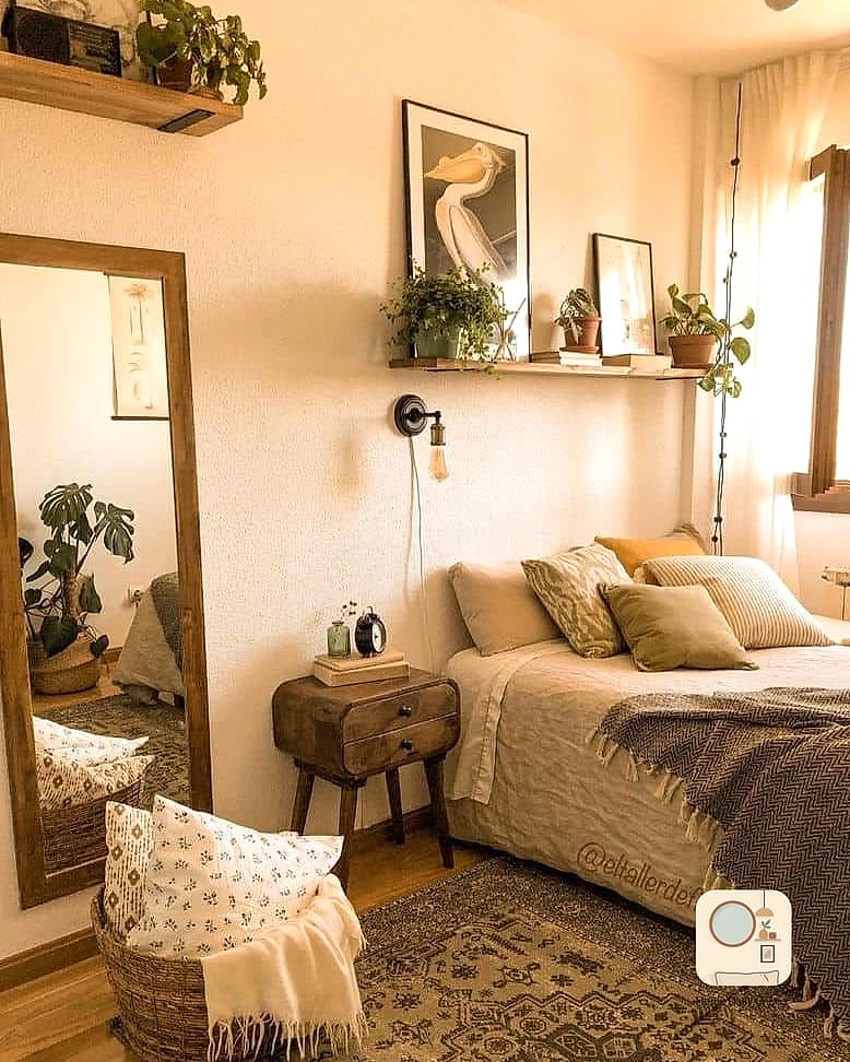 30 Cozy Bedroom Inspiration Boards You'll Want to Copy 26 Warm Gallery Wall Above the Bed